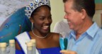 Maurice Adriaens met Miss Tourism Bonaire